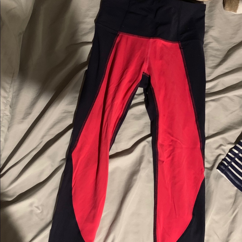 navy blue and pink cropped athleta yoga leggings